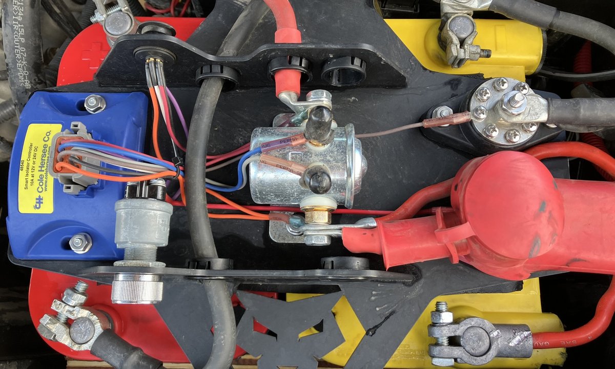 Dual battery setup with an isolation solenoid, smart controller, and connecting cables
